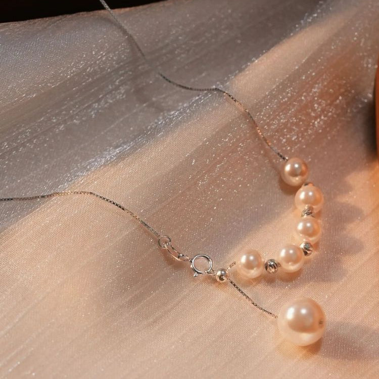 S925 Sterling Silver Smile Laser Pearl Necklace – Light Luxury Adjustable Sweater Chain for Women, High-End Temperament Jewelry